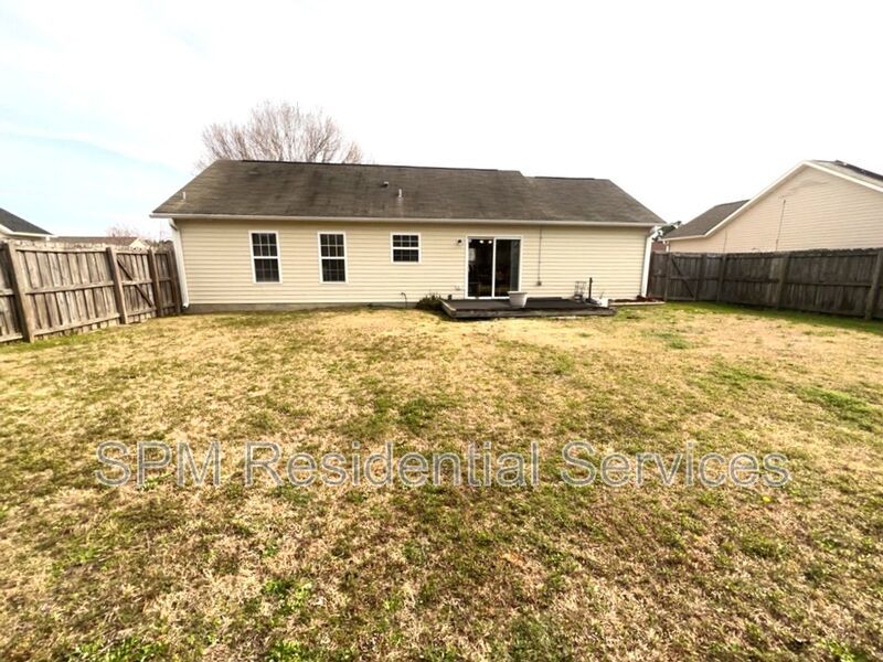 Fenced in backyard property image