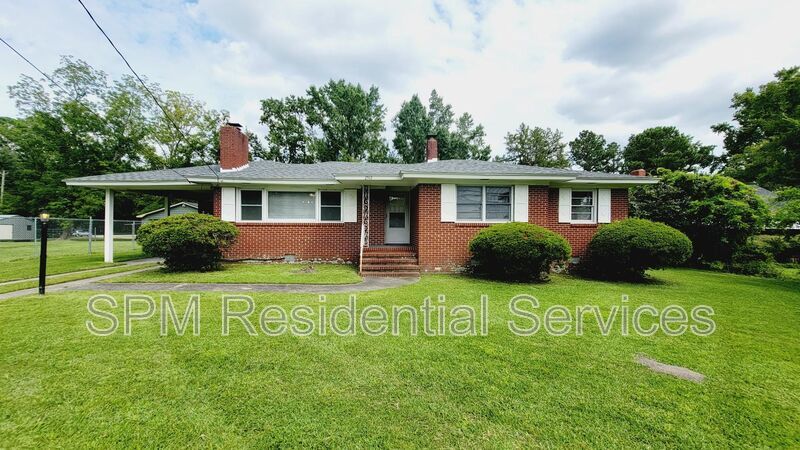 3 bedroom 1.5 bath brick ranch with storage building on .4 acres property image
