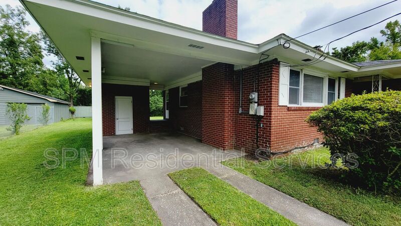 3 bedroom 1.5 bath brick ranch with storage building on .4 acres property image