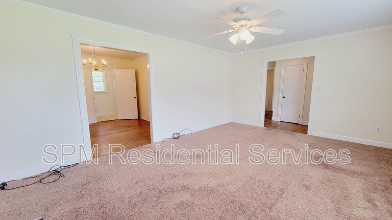 3 bedroom 1.5 bath brick ranch with storage building on .4 acres property image