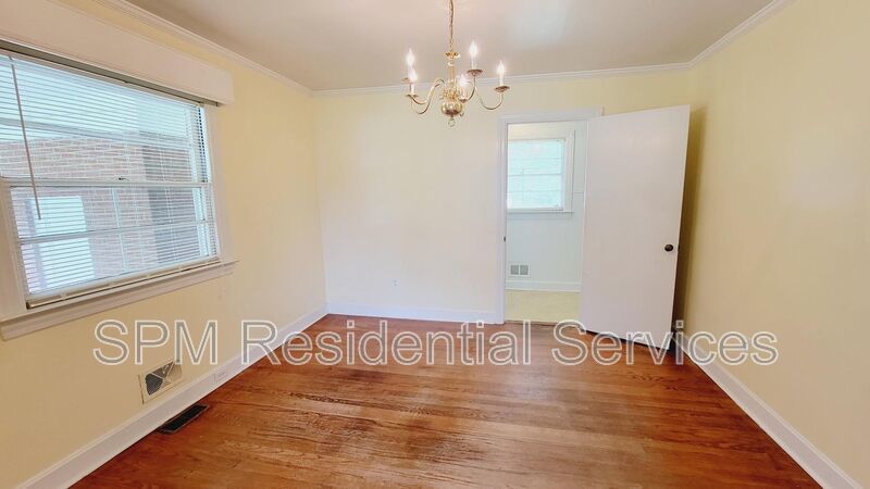 3 bedroom 1.5 bath brick ranch with storage building on .4 acres property image