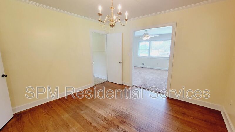 3 bedroom 1.5 bath brick ranch with storage building on .4 acres property image