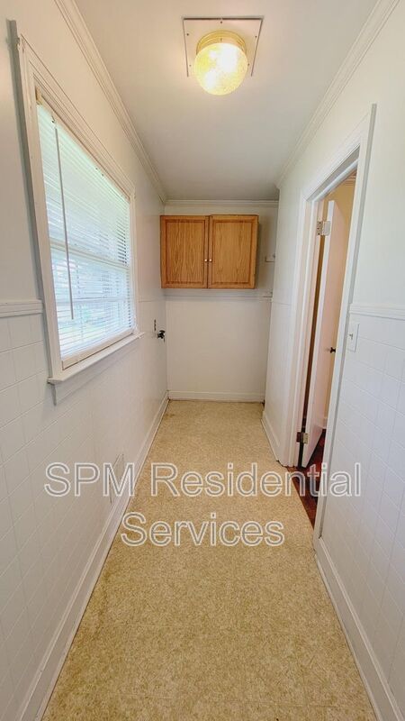 3 bedroom 1.5 bath brick ranch with storage building on .4 acres property image