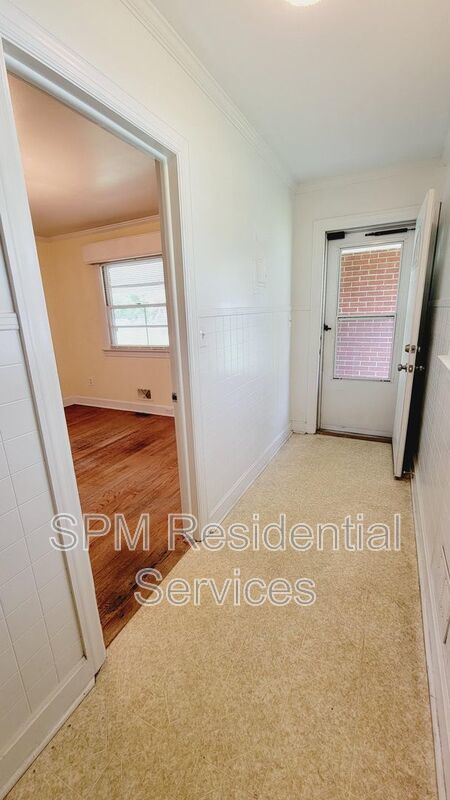 3 bedroom 1.5 bath brick ranch with storage building on .4 acres property image