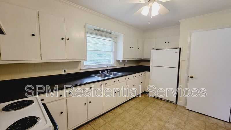 3 bedroom 1.5 bath brick ranch with storage building on .4 acres property image