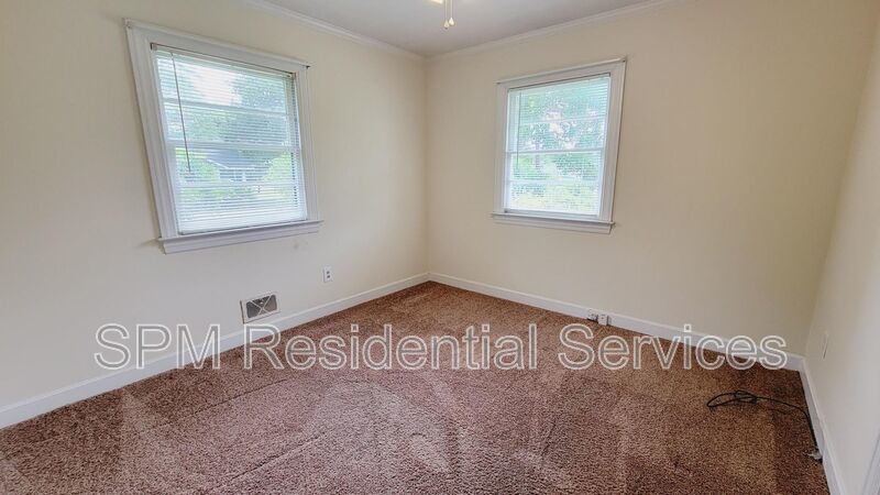 3 bedroom 1.5 bath brick ranch with storage building on .4 acres property image