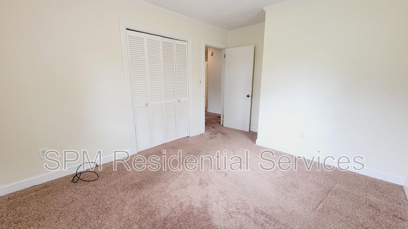 3 bedroom 1.5 bath brick ranch with storage building on .4 acres property image