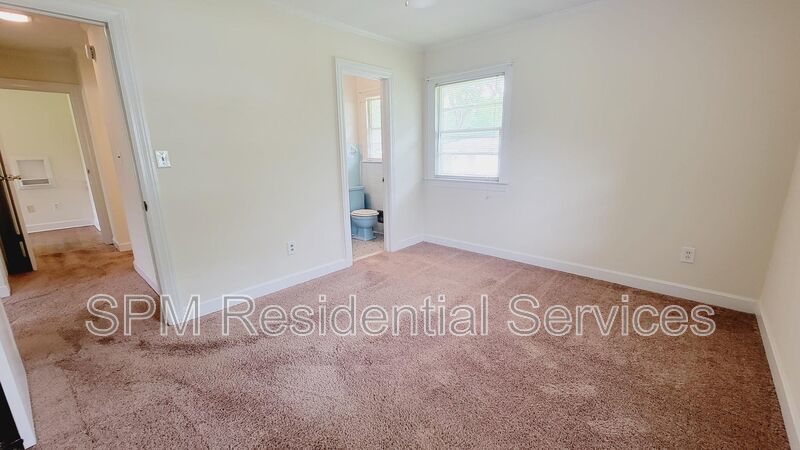 3 bedroom 1.5 bath brick ranch with storage building on .4 acres property image