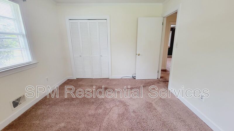 3 bedroom 1.5 bath brick ranch with storage building on .4 acres property image