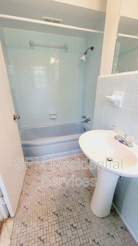 3 bedroom 1.5 bath brick ranch with storage building on .4 acres property image