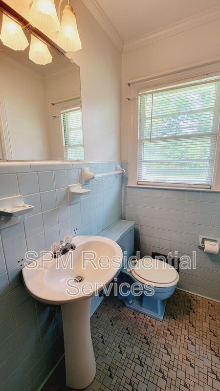 3 bedroom 1.5 bath brick ranch with storage building on .4 acres property image