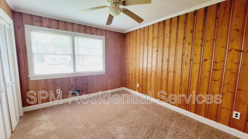 3 bedroom 1.5 bath brick ranch with storage building on .4 acres property image