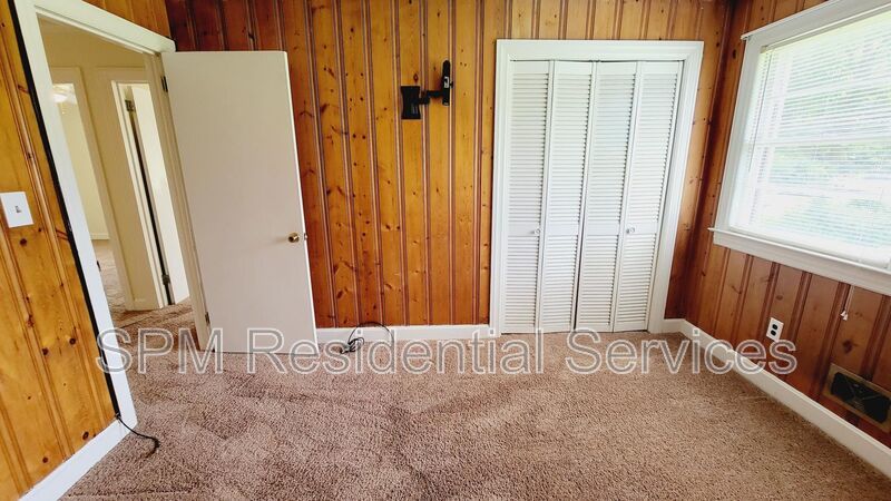 3 bedroom 1.5 bath brick ranch with storage building on .4 acres property image