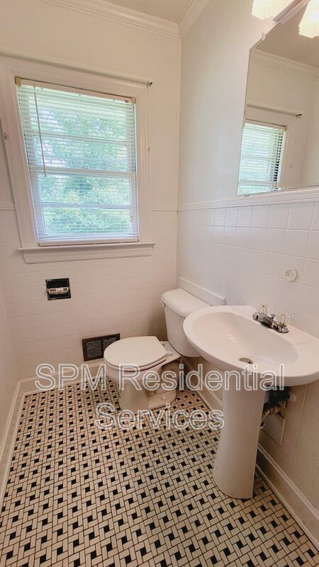 3 bedroom 1.5 bath brick ranch with storage building on .4 acres property image