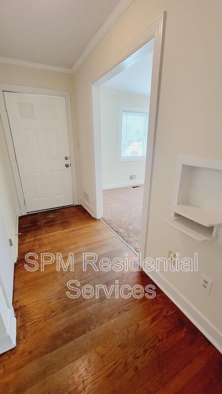 3 bedroom 1.5 bath brick ranch with storage building on .4 acres property image
