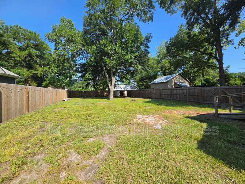Close to UNCW and Wrightsville Beach, Parcel fenced in backyard property image