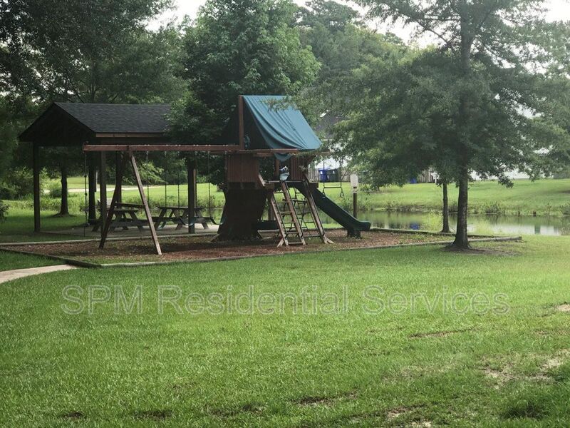 Fenced in patio and Community Playground property image